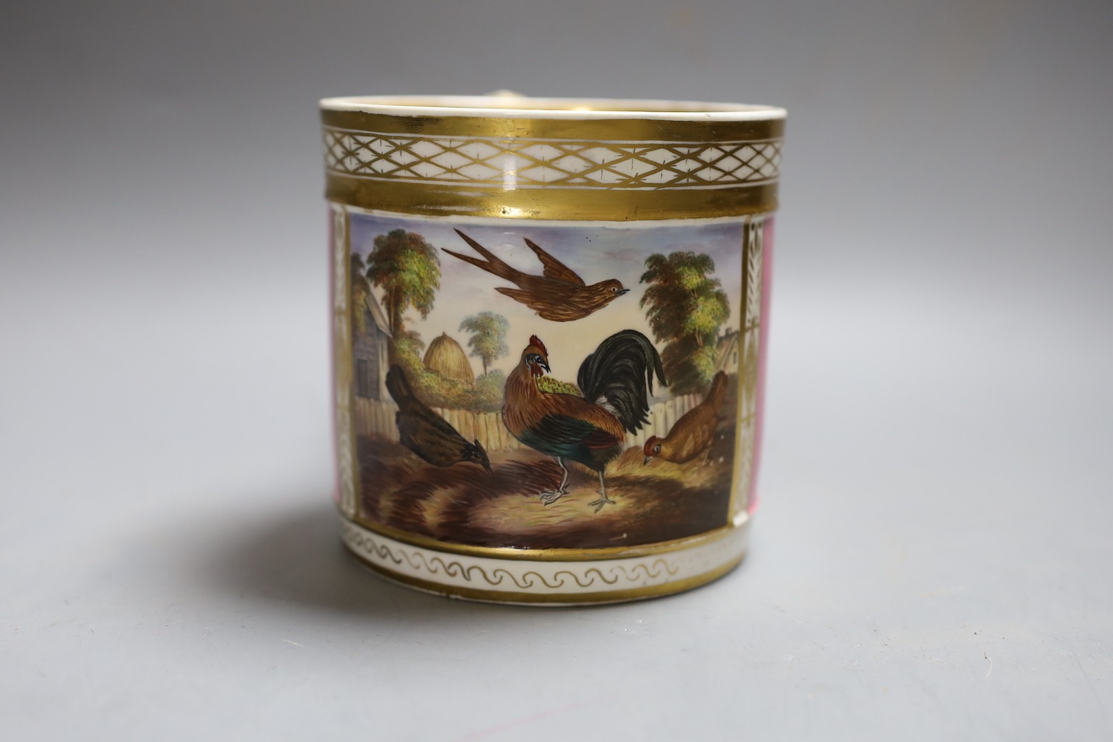 A Derby porter mug of large size painted with birds in a garden scene within a gilt panel on a pink ground c.1825, Red circle mark 11.5cm